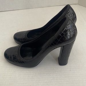 Authentic Prada embossed patent cap toe pumps